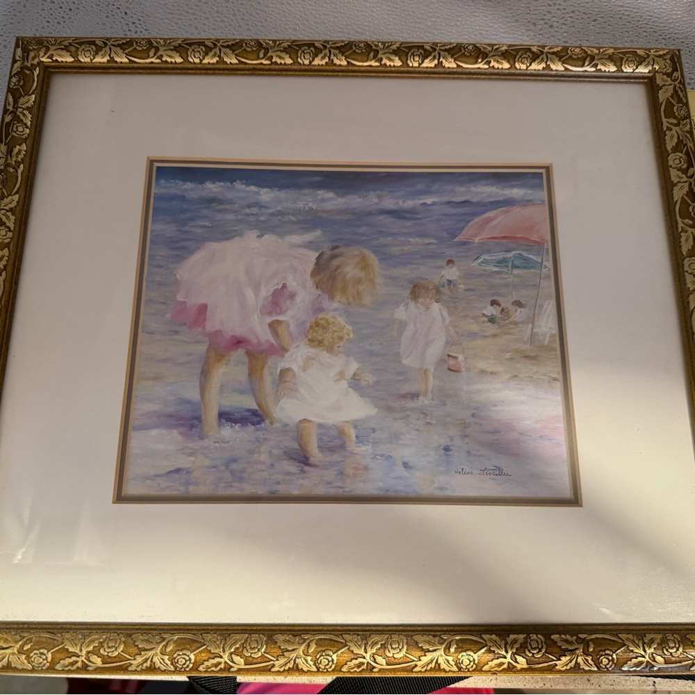 Framed Beach Scene Painting with Gold Frame .